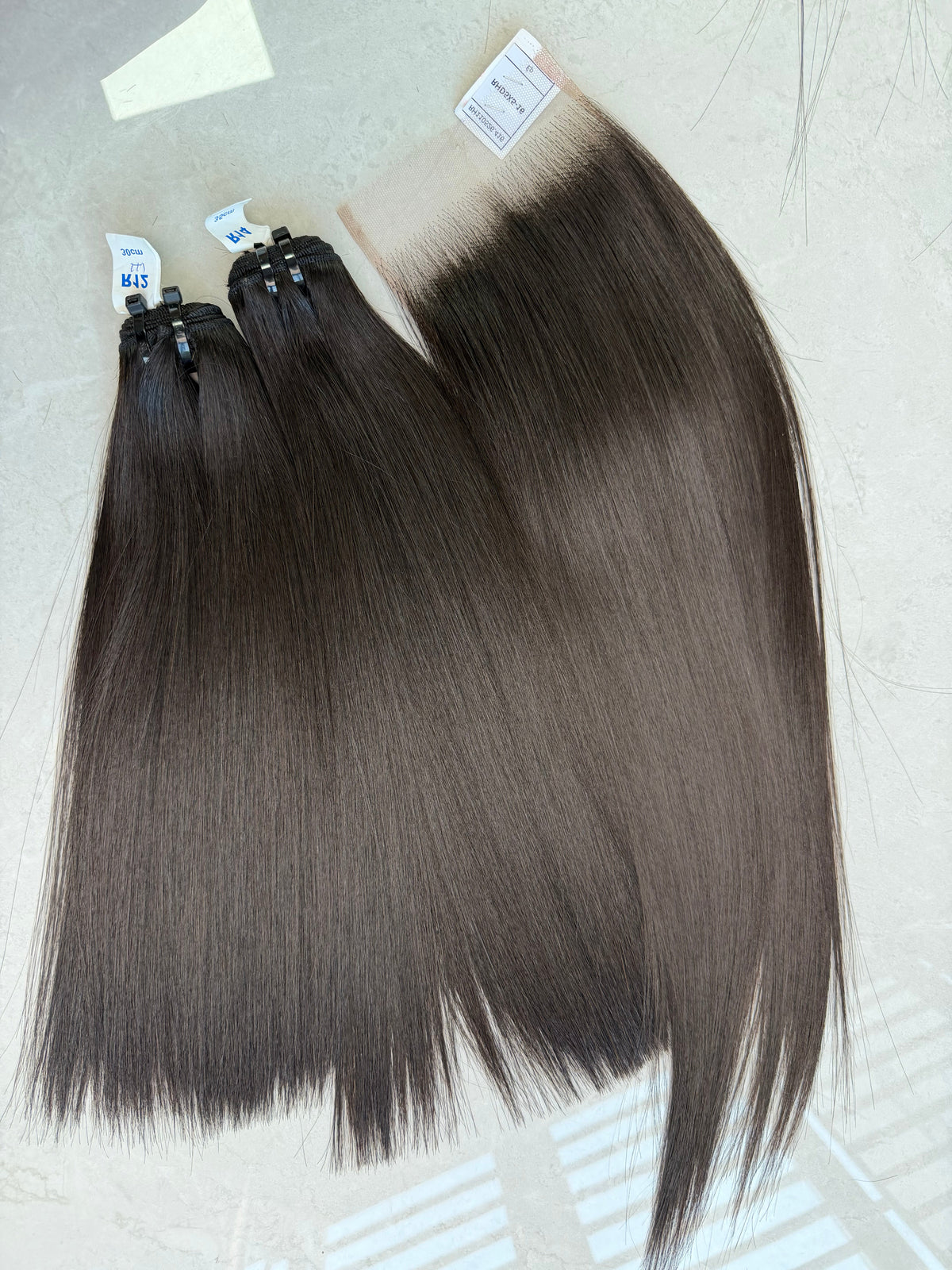 Raw Vietnamese hair bundle pack 14 inch bone straight, 2 bundles and hd 5x5 closure shown together