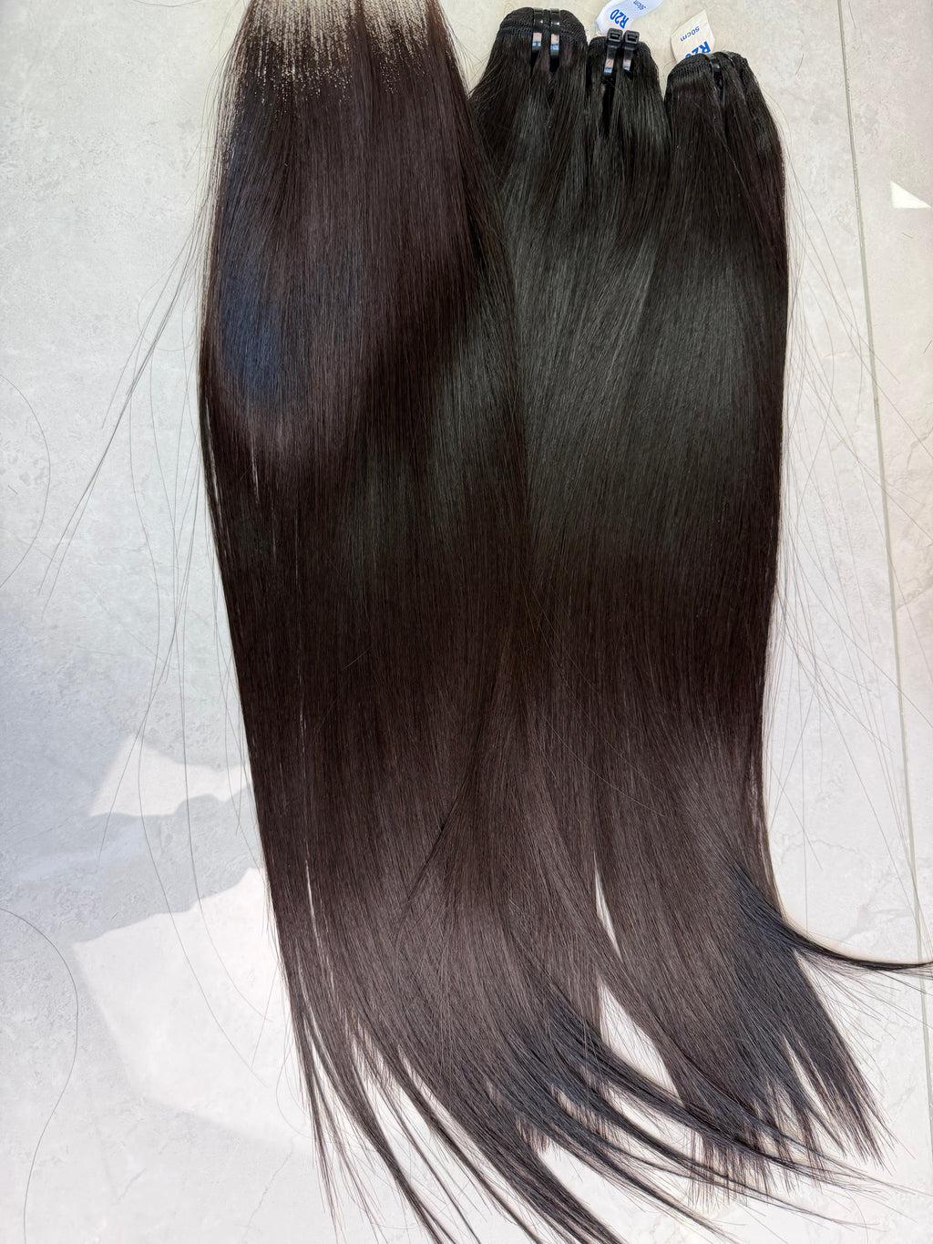 Raw Vietnamese hair bundle pack 20 inch bone straight, 2.5 bundles and hd 5x5 closure shown together