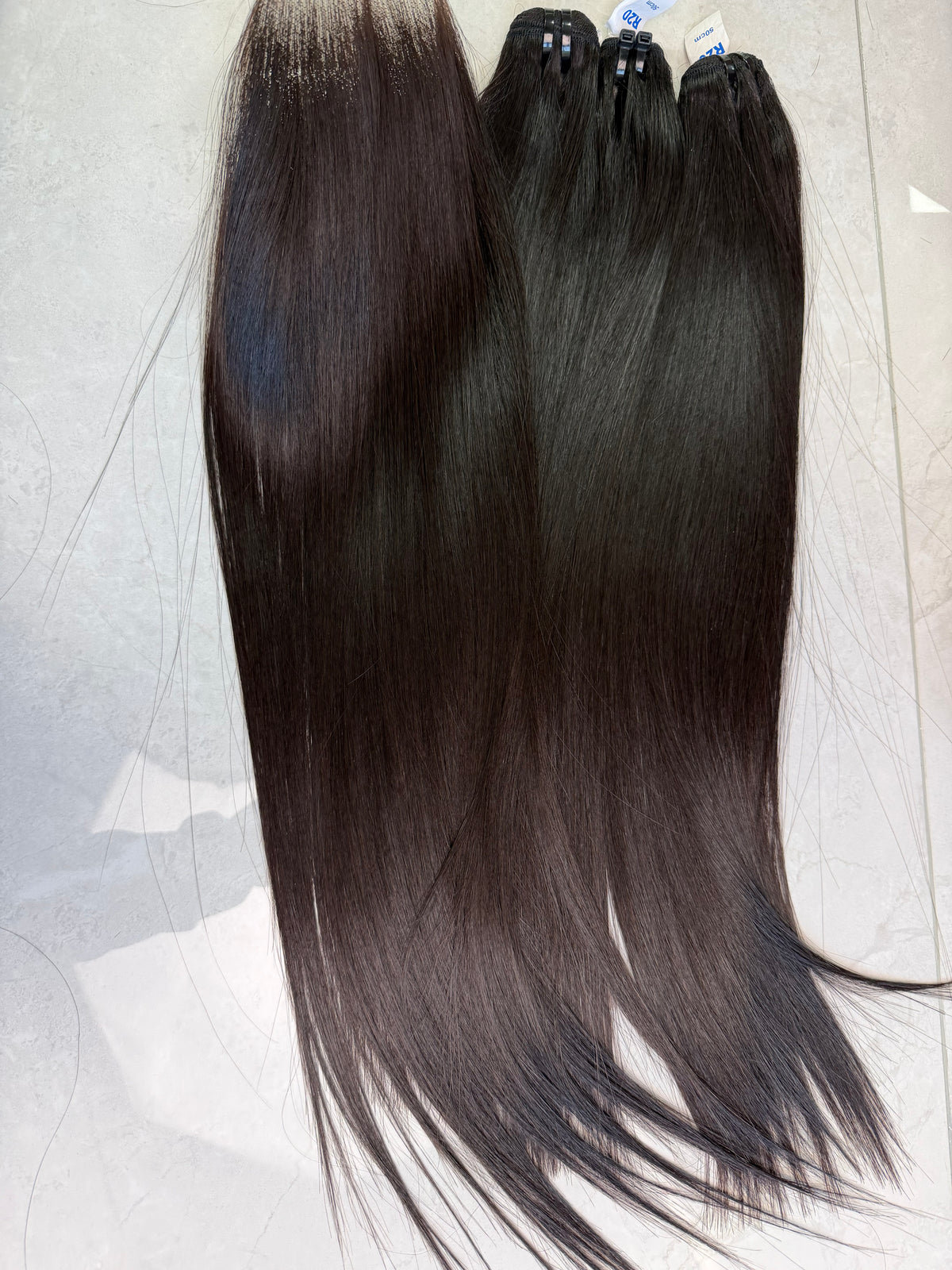 Raw Vietnamese hair bundle pack 20 inch bone straight, 2.5 bundles and hd 5x5 closure shown together